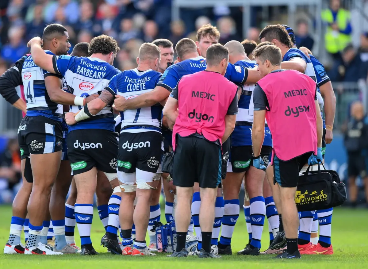 George Gauntlett supporting Bath Rugby players during on-field medical care