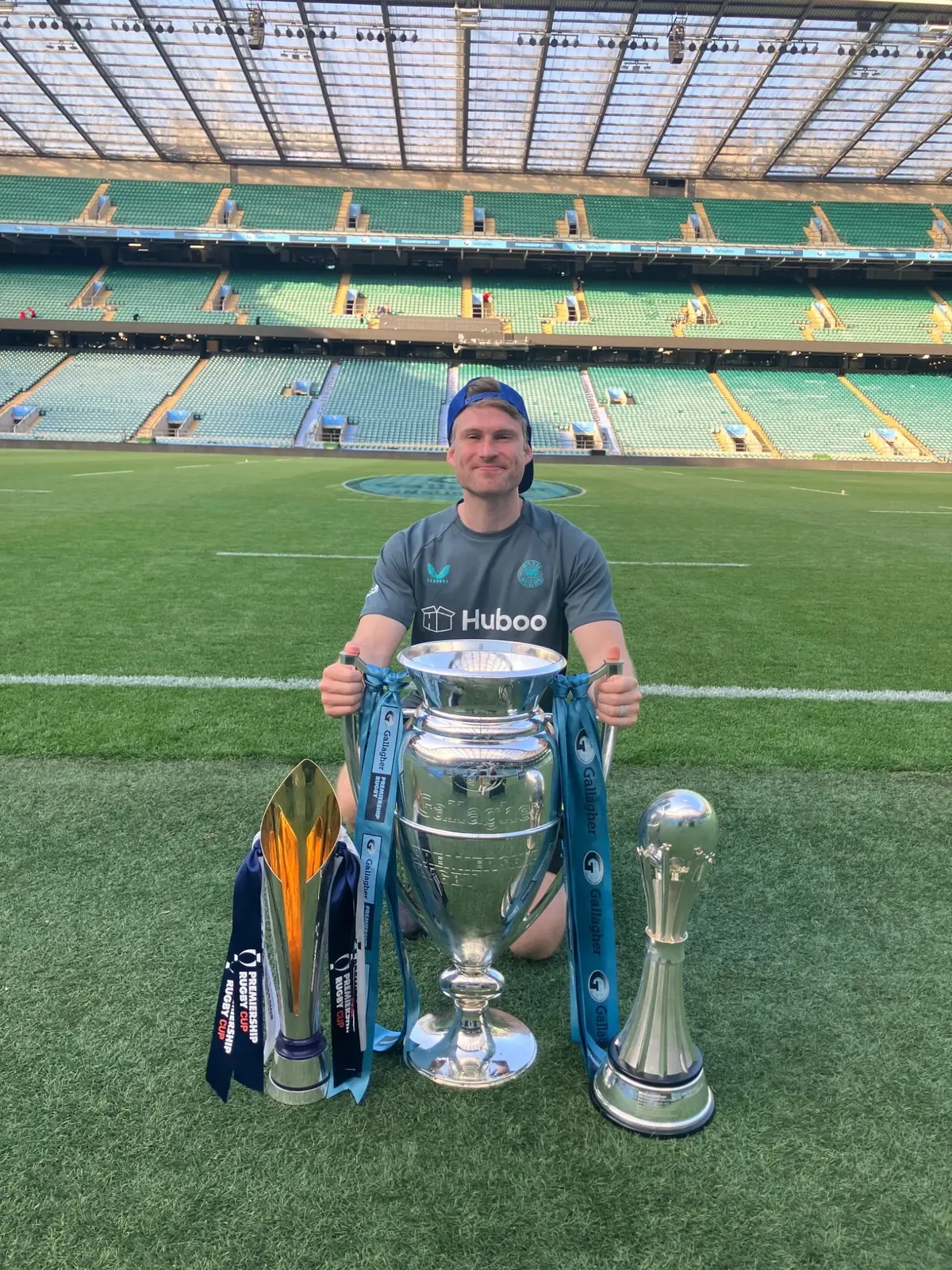 George Gauntlett with rugby trophies at Twickenham Stadium